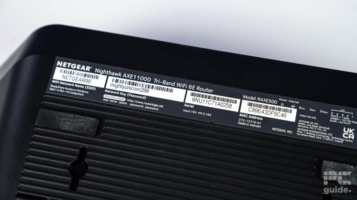 Netgear Nighthawk RAXE500 underside stickers, Image by PC Guide