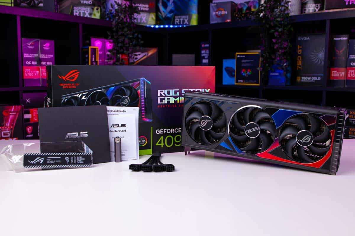 Image shows the ASUS ROG Strix Gaming RTX 4090 next to its original box and accessories.