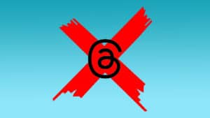 How to delete your Instagram Threads account - explained. Image shows Threads logo with a big red 'X' behind it, on a blue background.