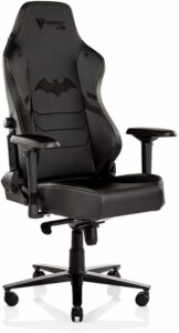 A black Secretlab Titan 2020 gaming chair with the Batman logo on it.