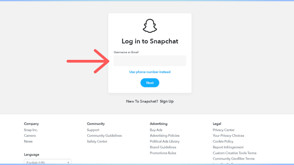 Screenshot of the Snapchat Web login page with an arrow pointing to the "use phone number instead" link under the username field.