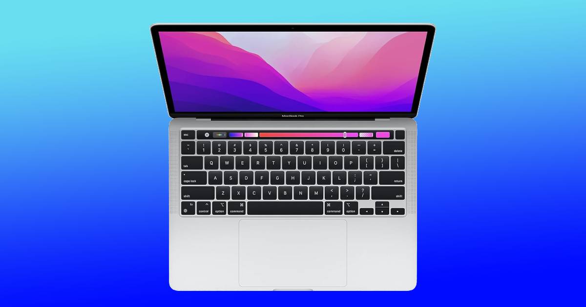 A MacBook Pro laptop on a blue background.