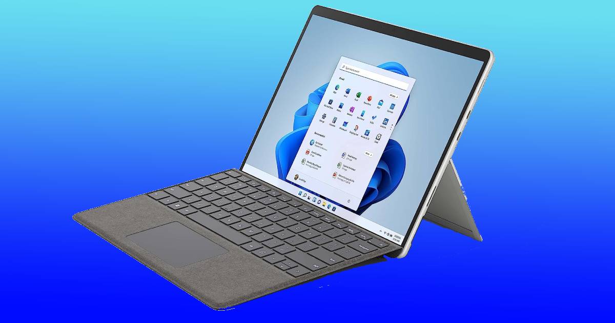 A Surface Pro laptop with a screen on it displayed on a blue background.