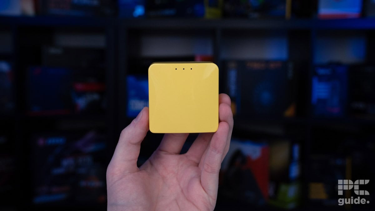 GL.iNet GL-MT300N-V2 Mango held up, Image by PC Guide