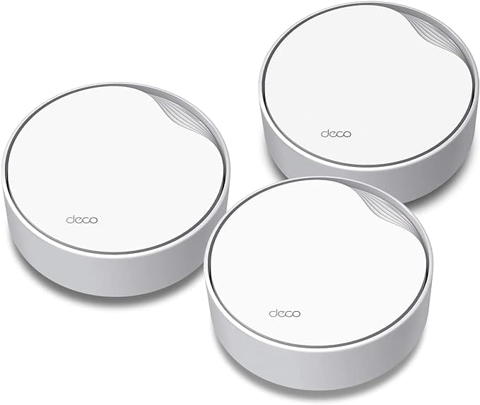 Three TP-Link Deco AX3000 mesh WiFi routers arranged on a white background.