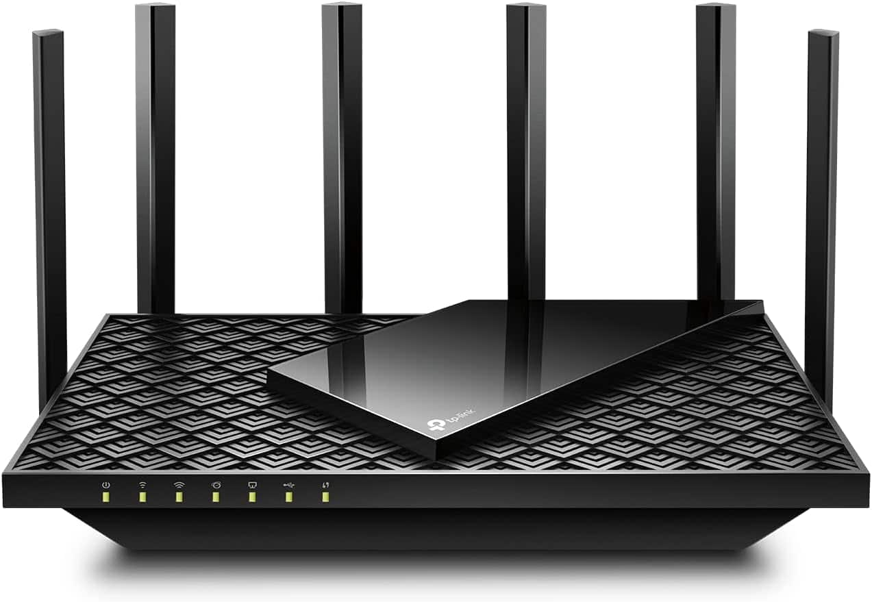 Black TP-Link Archer AX72 wireless router with eight antennas and a geometric pattern design on the surface, displaying several illuminated indicator lights.