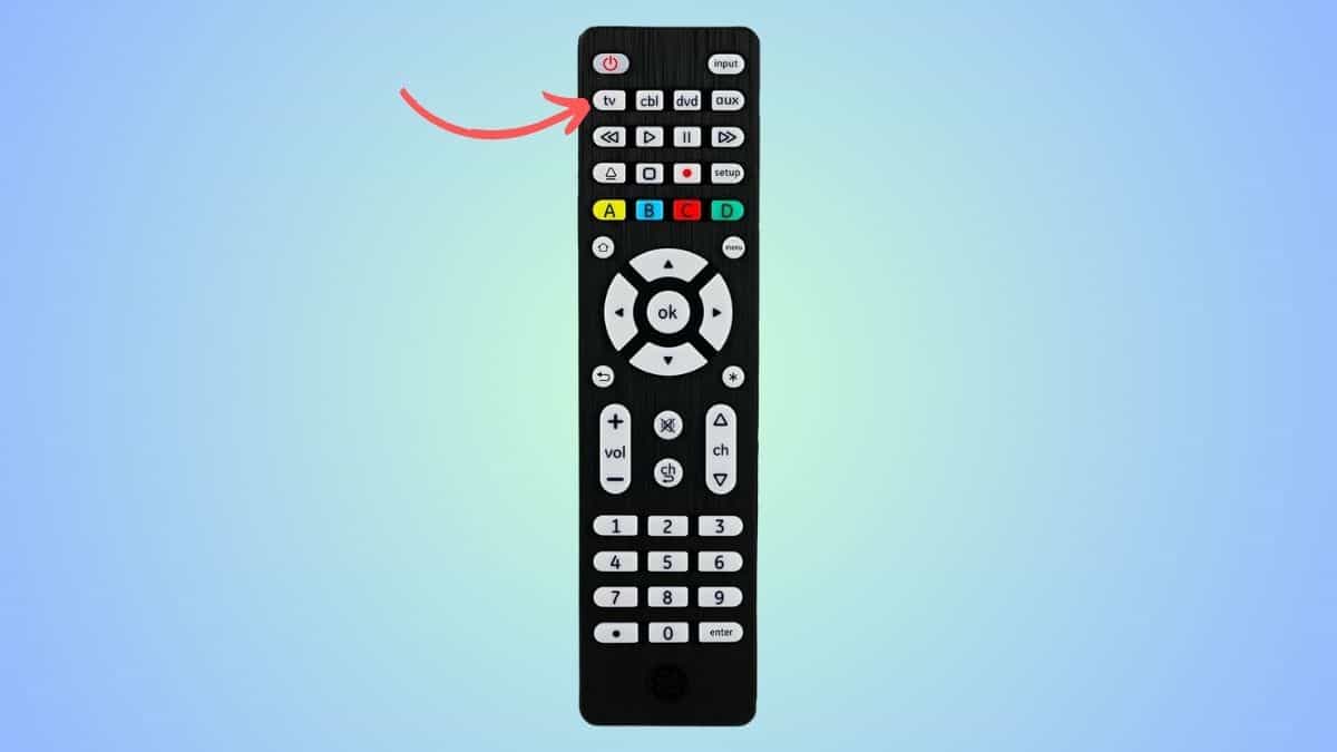Universal remote with an arrow pointing at the TV button