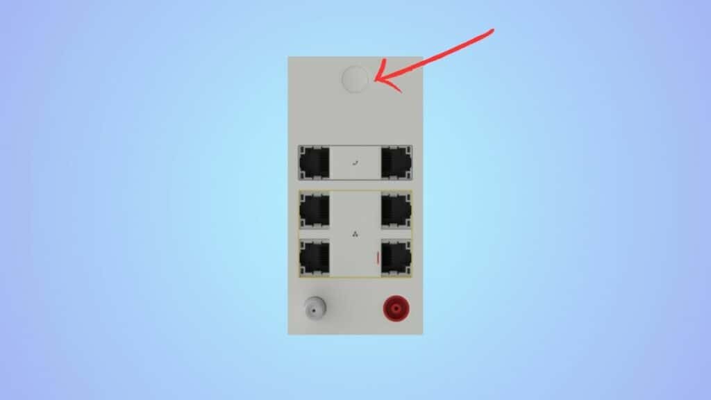 Ethernet patch panel with a red arrow pointing to a circular marking at the top of the Cox router.