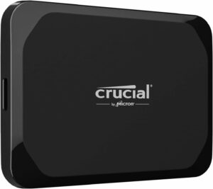 A portable black box labeled as "Crucial".