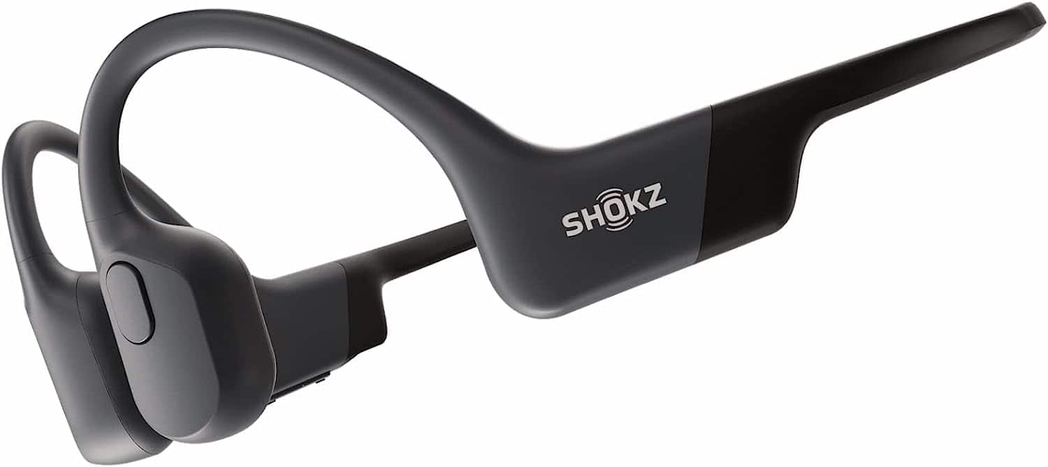 A pair of black AfterShokz Aeropex headphones with the logo "SHOKZ" on them.