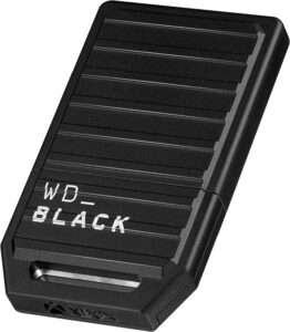A 500GB black USB drive with the word WD_BLACK on it.