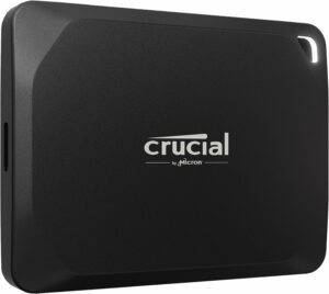 A black Crucial external hard drive.