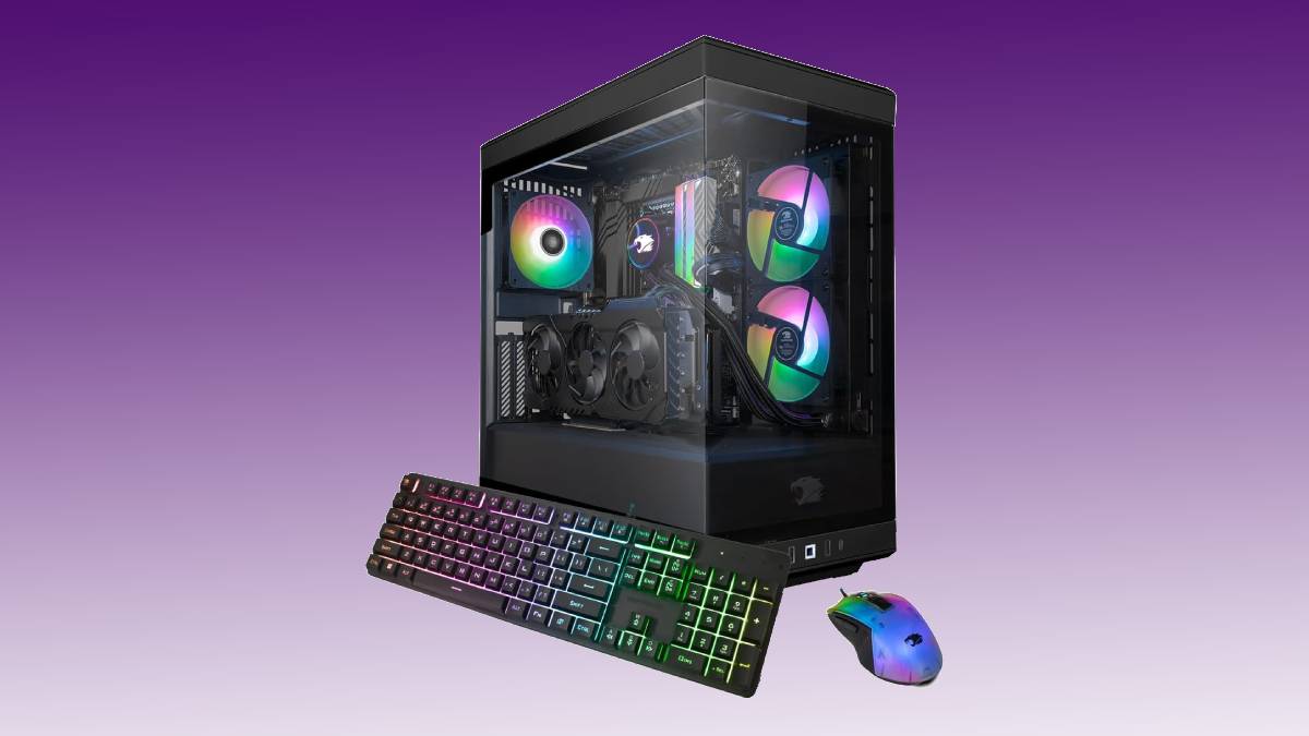 An impressive gaming pc with a keyboard and mouse on a purple background.