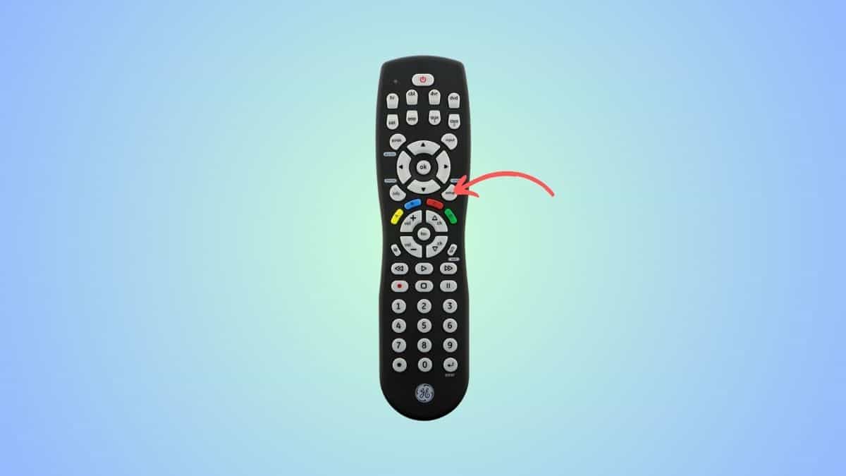 A universal remote compatible with vizio tv with an arrow showing the setup button