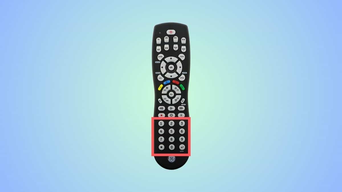 A universal remote compatible with vizio tv with an arrow showing the number buttons
