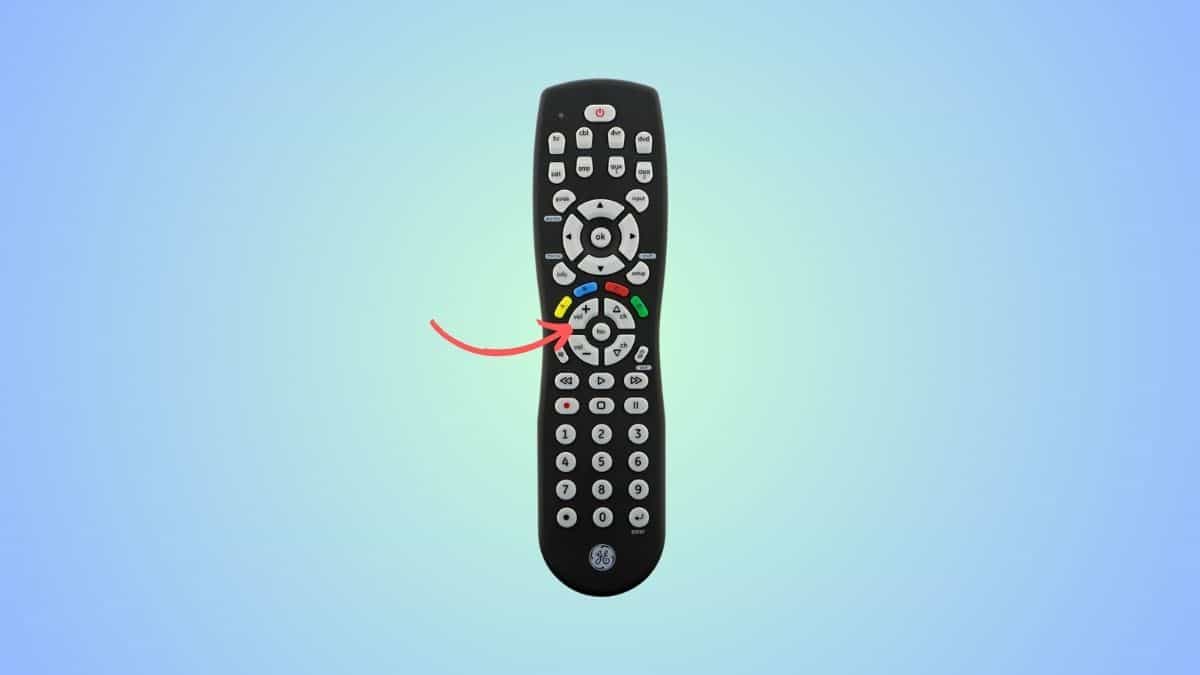 A universal remote compatible with vizio tv with an arrow showing the volume up button