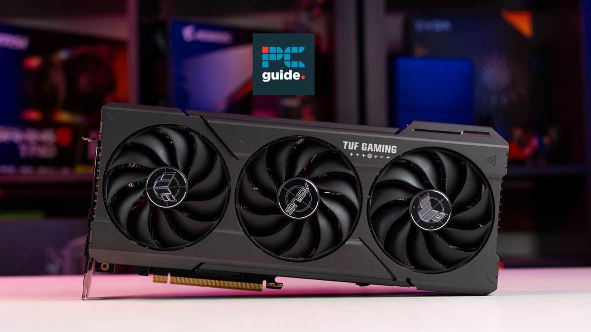 Asus TUF Gaming Best RTX 4070 Super graphics card with three fans, displayed prominently against a blurred background with colorful lighting.