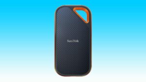 A black and orange portable speaker on a blue background for an Amazon deal.