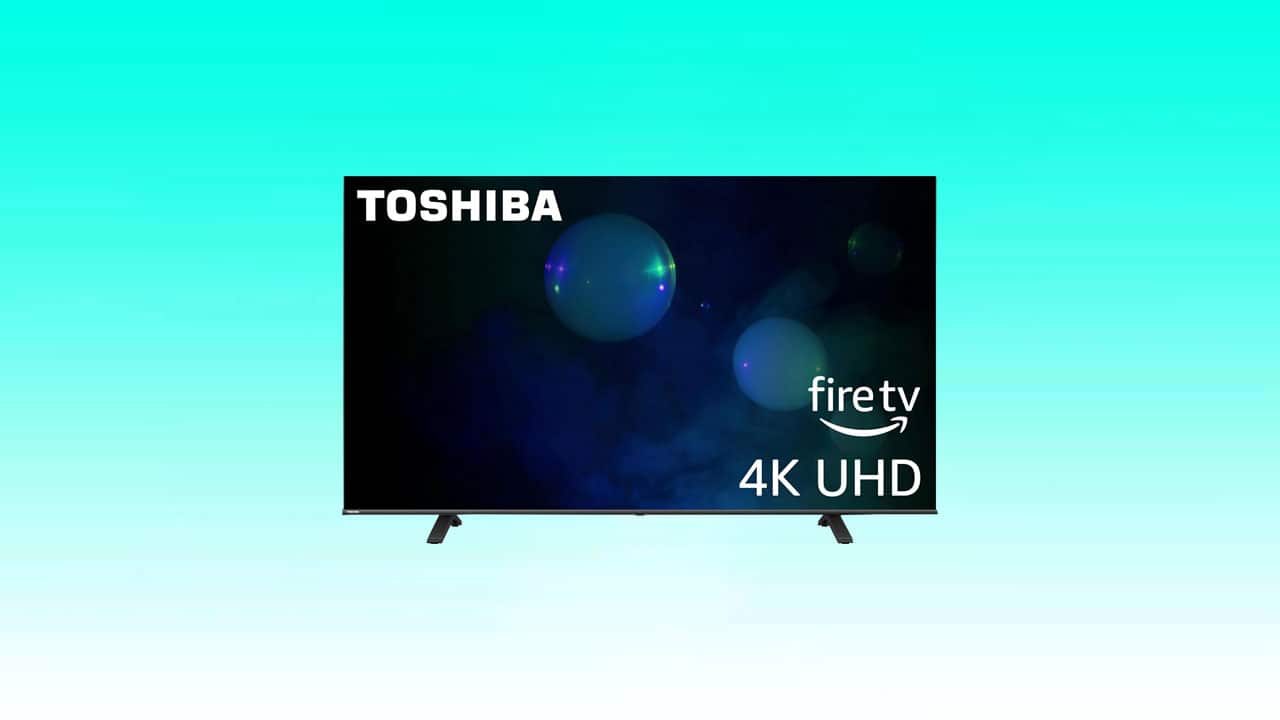 A Toshiba C350 4K Smart Fire TV displaying a screen saver with floating bubbles.