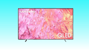 A Samsung QLED 4K television displaying an abstract pink and purple pattern during the Big Spring Sale.