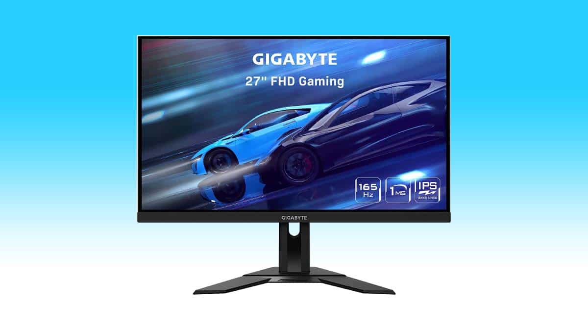 A 27-inch Gigabyte gaming monitor displaying a car racing game, featuring a 165Hz refresh rate and IPS panel.