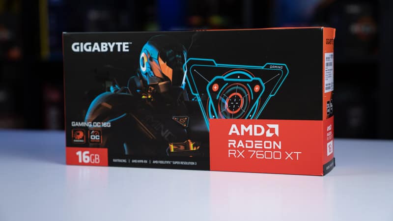 Gigabyte AMD Radeon RX 7600 XT graphics card box on a desk.