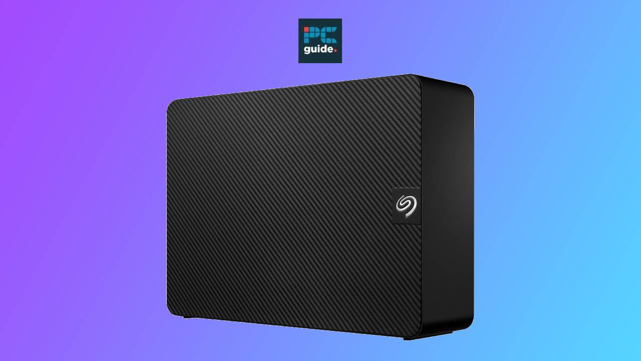 Black Seagate 14TB external hard drive with a logo on the front, displayed against a blue and purple background with the word "guide" in the upper left corner.