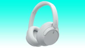 White Sony WH-CH720N over-ear wireless headphones against a gradient background.