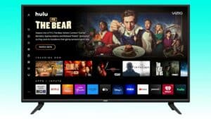 A VIZIO 50-inch V-Series smart TV displaying the Hulu interface with a featured banner for the show "The Bear" above a selection of trending content and streaming service apps.