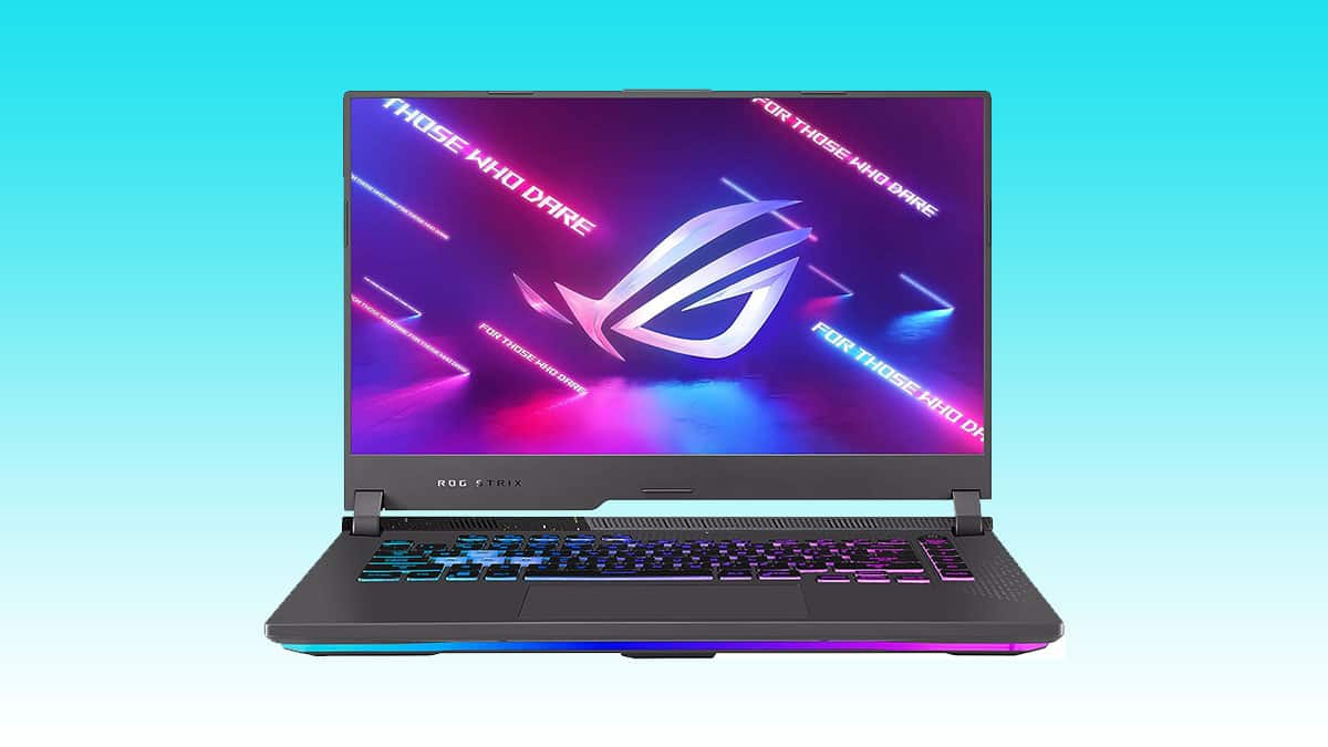 Gaming laptop with RGB keyboard and ASUS ROG G15 logo on display against a blue background.