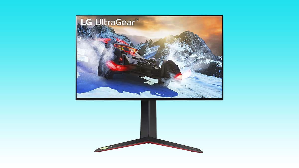 Lg ultragear gaming monitor displaying a car racing game with a snowy mountain background.