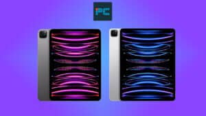 Two Apple iPad Pros with colorful abstract wallpapers on a purple background.