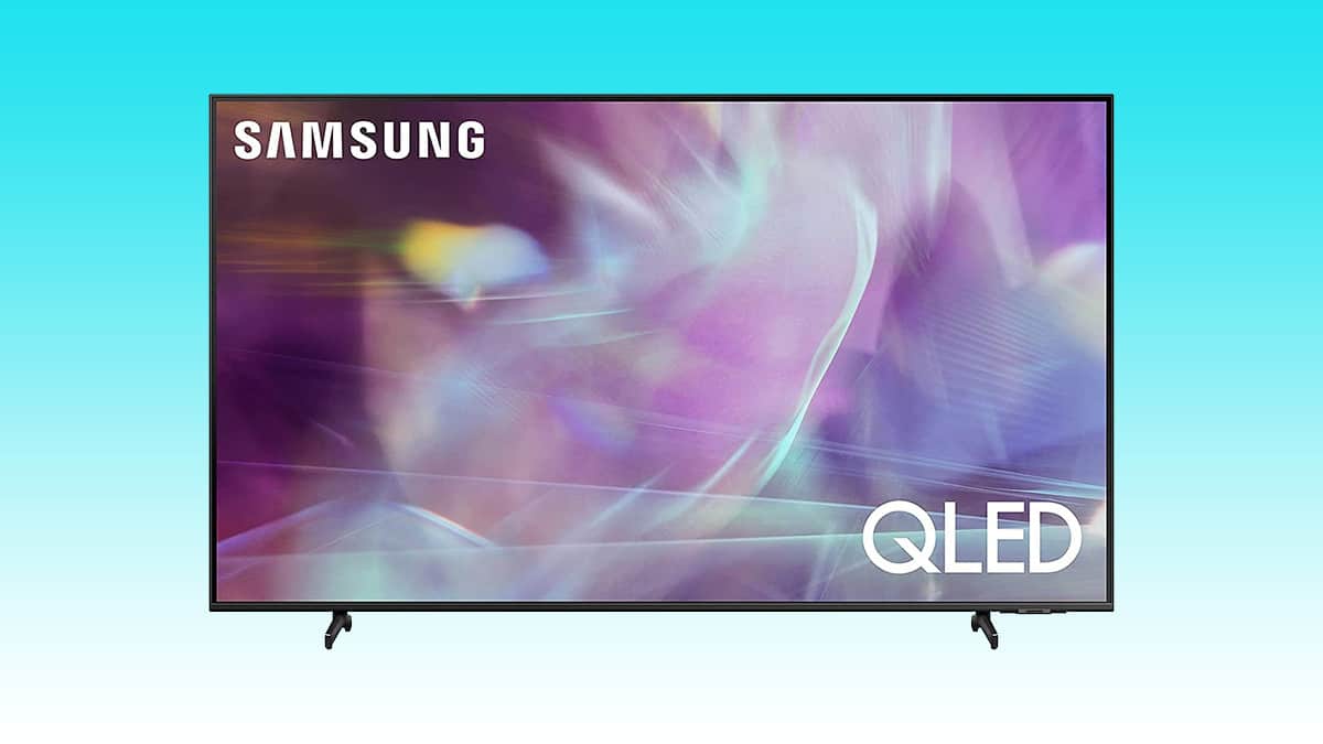 A Samsung 32-inch 4K QLED smart TV displaying colorful abstract imagery.