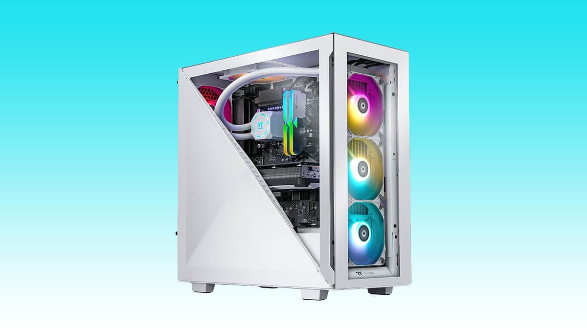 Custom gaming pc with auto draft and rgb lighting inside a white tower case.
