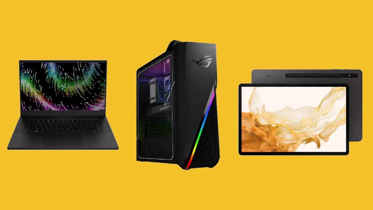 A laptop, a gaming PC tower, and a graphics tablet against a yellow background featuring gaming PC tech deals.