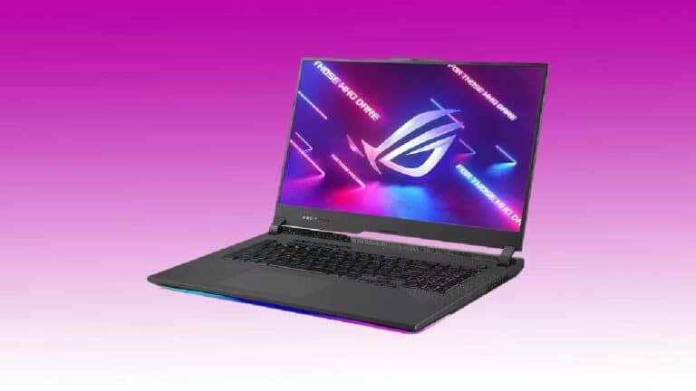 A gaming laptop with an illuminated ASUS ROG Strix G17 logo displayed on the screen, set against a pink and purple gradient background.