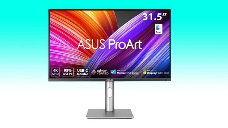 A 31.5-inch ASUS ProArt monitor displaying vibrant colors, with 4K UHD resolution and HDR technology, on a blue background.