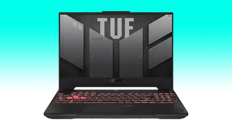 A black Asus TUF gaming laptop with a red-backlit keyboard, displayed against a gradient blue background.