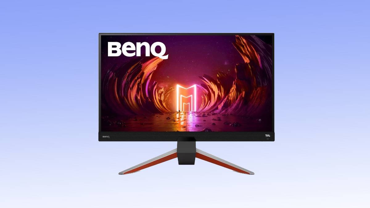 A gaming benq monitor displaying a colorful abstract wallpaper, set against a plain background.