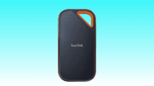 Portable SanDisk Extreme PRO SSD with an orange loop on the top right, displayed against a blue background.