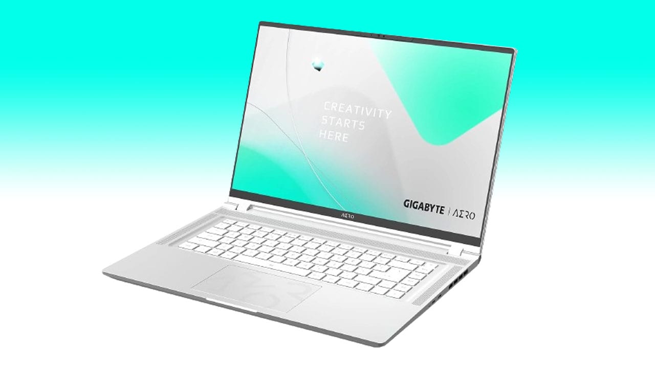 A gigabyte laptop deal open on a gradient background with the text "creativity starts here" on its screen.