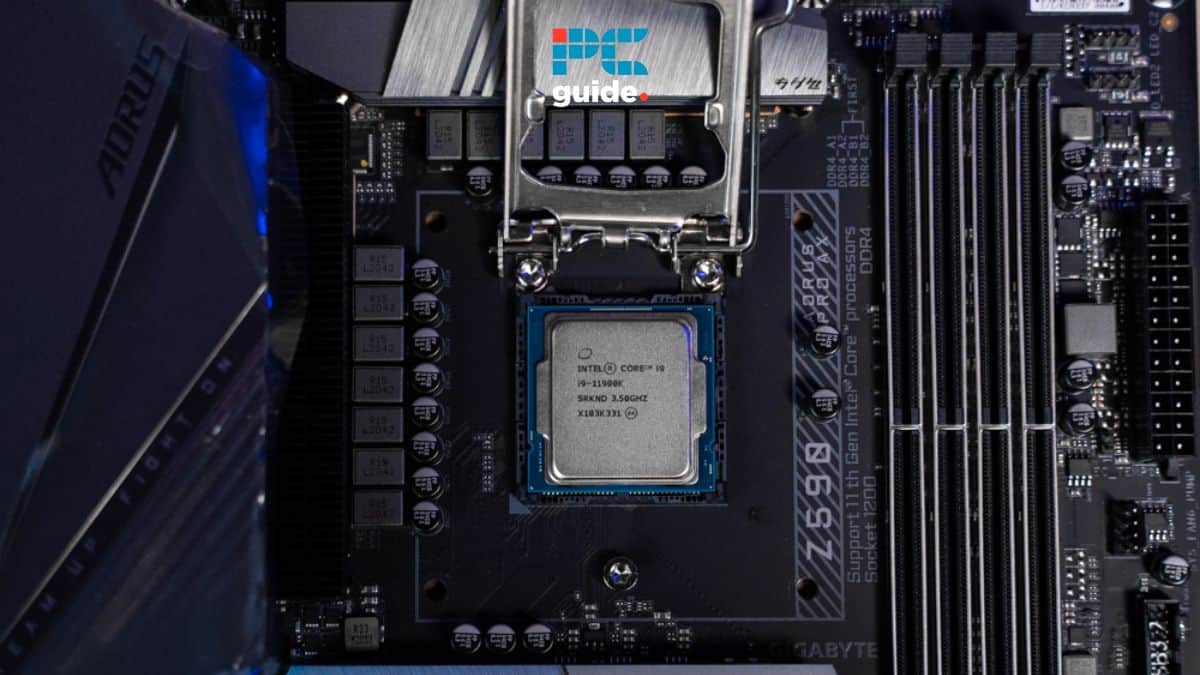 Close-up of an intel CPU installed on a motherboard with visible RAM slots, components labeled in detail, and tips on how to lower CPU temp.