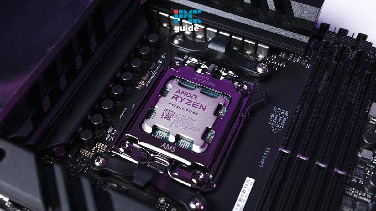 An AMD Ryzen CPU installed on a motherboard, demonstrating how to make Spotify use less CPU, and highlighting the processor's purple retention bracket and surrounding components. Image taken by PCGuide.com