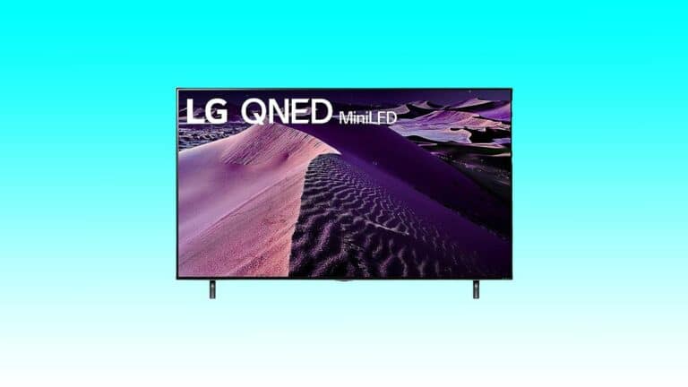 An LG 55" QNED85 miniled television displays a vibrant image of a sand dune under a purple sky on a turquoise background.