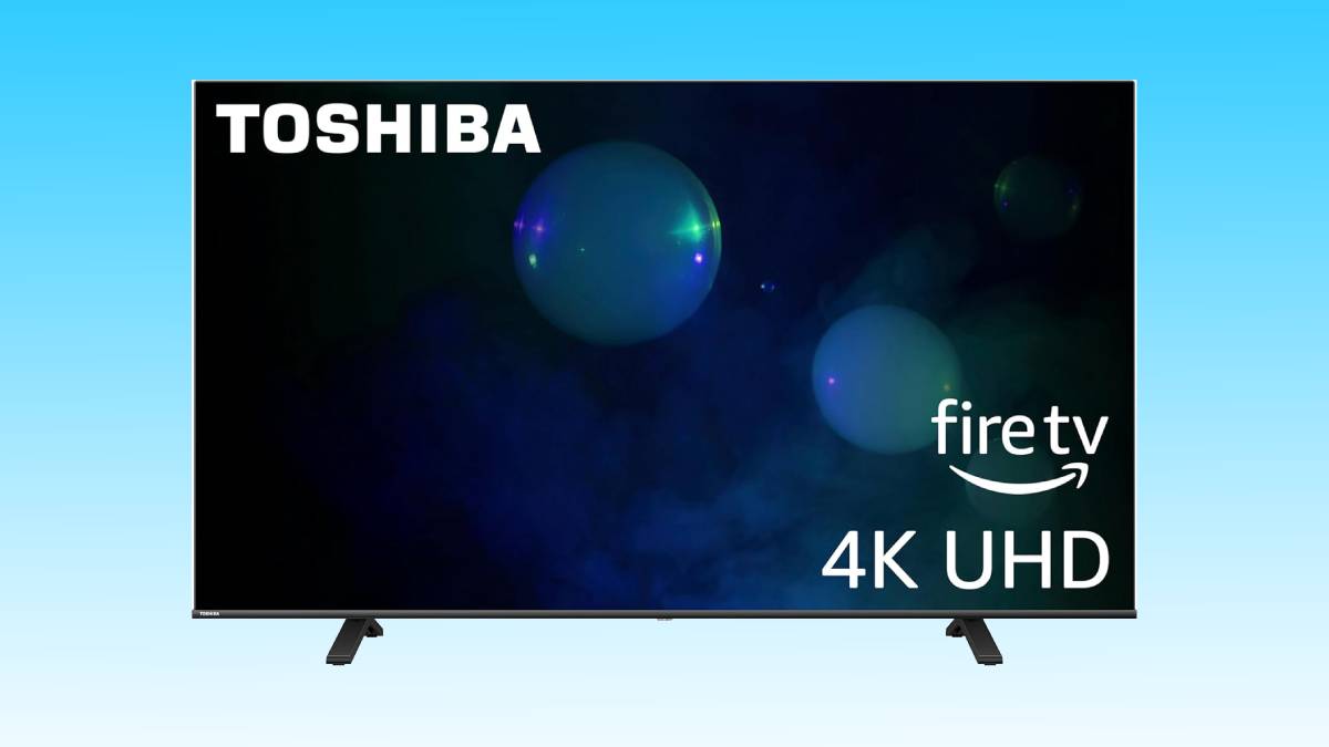 A toshiba 4k uhd fire tv displaying a screensaver with colorful orbs and a dark background.