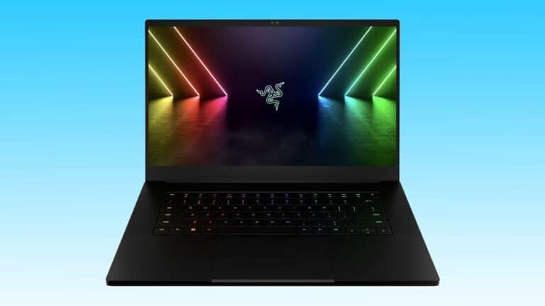 A Razer Blade gaming laptop displaying colorful neon lights on its screen, featuring a backlit keyboard and a black frame, set against a blue background.