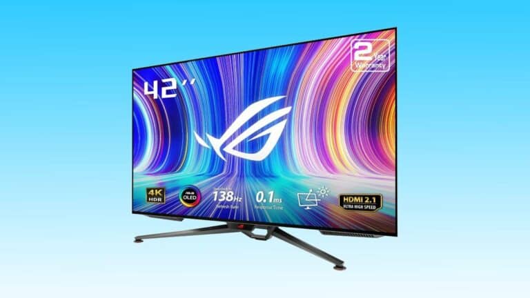 A 42-inch Asus ROG gaming monitor with Auto Draft, displaying vibrant colors on the screen, mounted on a modular stand against a blue background.