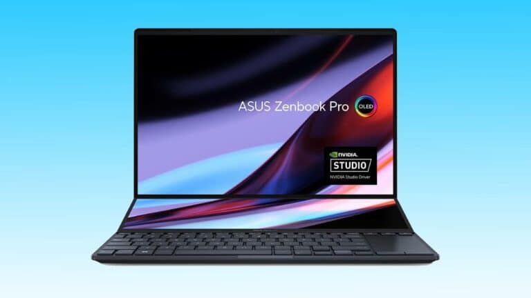 Asus Zenbook Pro laptop with OLED display, showcasing features including Nvidia Studio on a gradient blue background with Auto Draft.