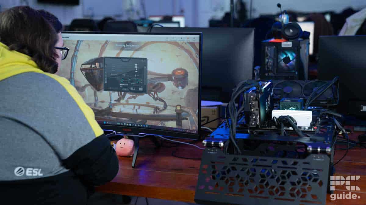 Sebastian Kozlowski runs synthetic benchmarks on the PC Guide GPU test rig ©BGFG