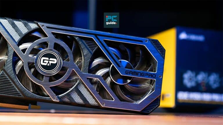A close-up of a modern RTX 4060 Ti gaming graphics card with a dual-fan design on a blurred background.